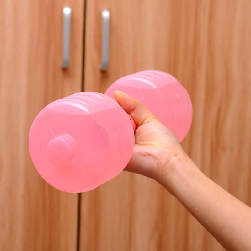Water Dumbbell Bottle  Fitness & Yoga Training Equipment held in hand, showcasing its unique design and functionality.
